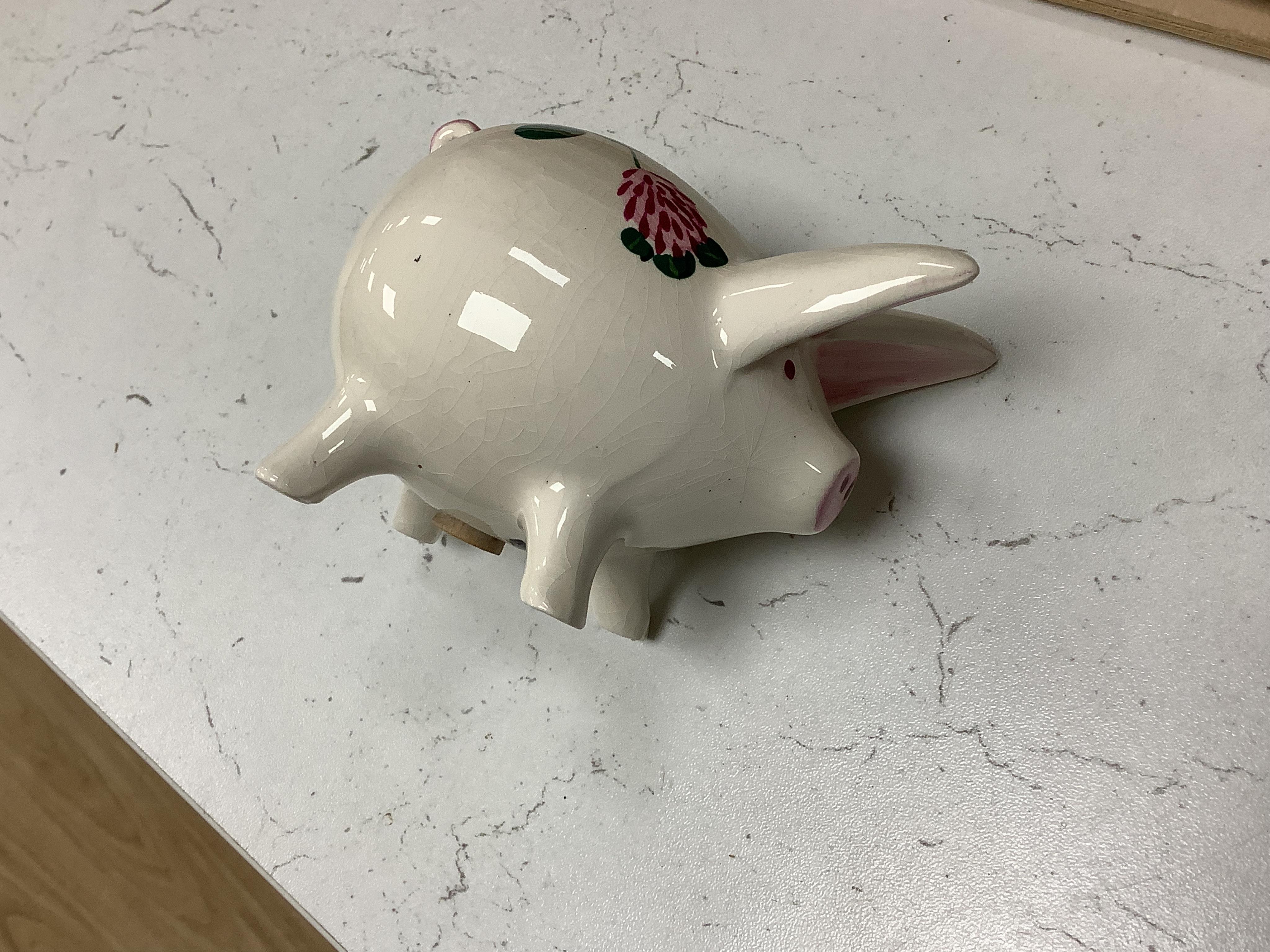 Three Plichta ‘pig’ ceramic money banks, each stamped to the bases, largest 16cm wide. Condition - fair